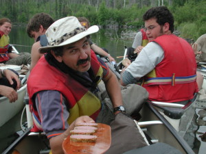 Using paddle as serving tray.  Explore the West Tours owner Richard Taylor receiving.